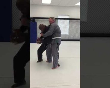 Brazilian Jiu-Jitsu self-defense against bear hug from behind